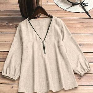 Chic Beige Blouse with Black Trim